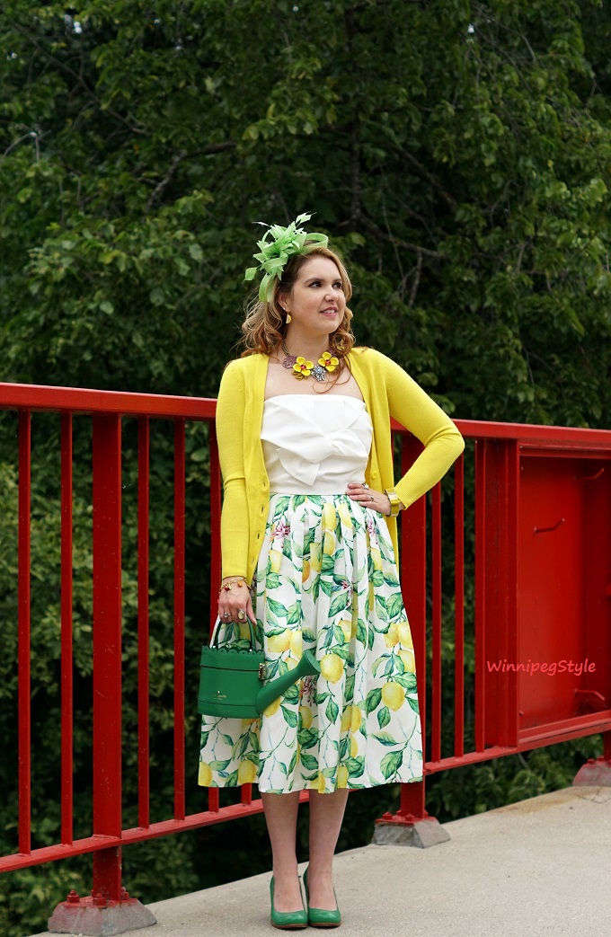 Winnipeg Style, Personal stylist, Chicwish lemon print skirt, Chicwish white bow sweet knot bustier top, Chie Mihara Oki green leather shoes, Precis Petite lime green feather fascinator, Kate Spade spring forward watering can bag purse